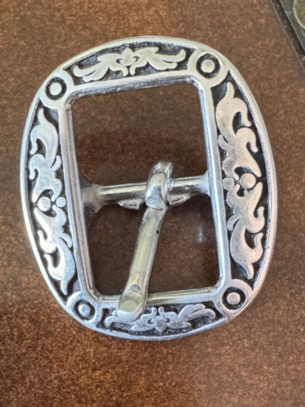 Decorative Silver-Tone Belt Buckle with Floral Engraving